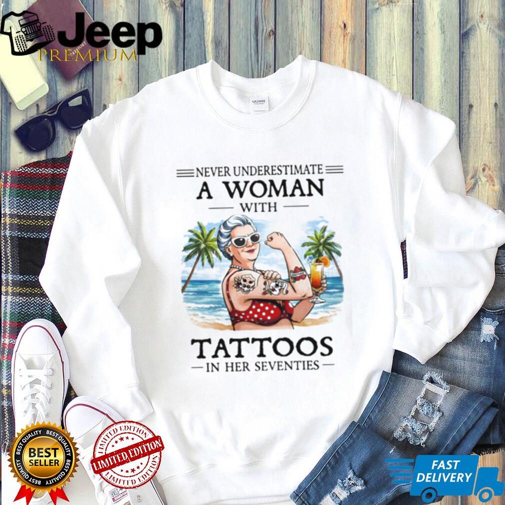 Never Underestimate A Woman With Tattoos In Her Seventies Beach Life T Shirt