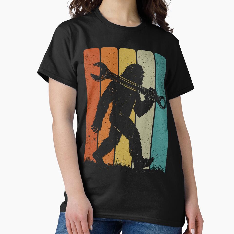 Bigfoot Mechanic - Retro Sasquatch carrying a Giant Combination Wrench by gunaone-design