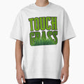 bold green touch grass by Madie Grace